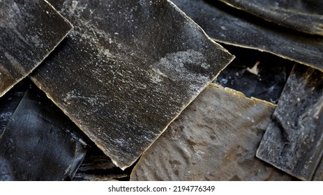 Dried Cut Kombu Dashi Seaweed Texture Background. Asian Cuisine Ingredient.