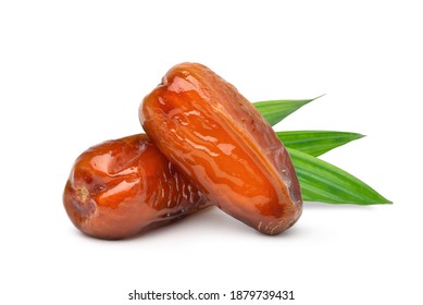Dried Date palm fruits with green leaf isolate on white background.