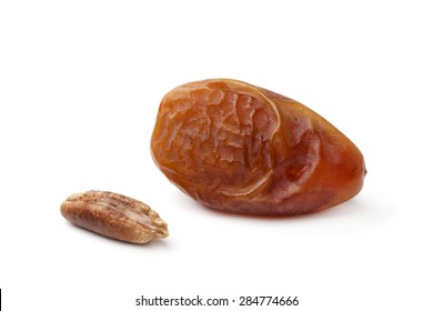 Dried Date And Seed On White Background