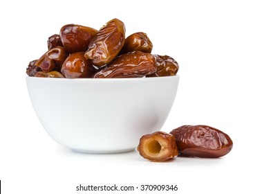 Dried Dates Fruit In A Bowl, Isolated On A White Background