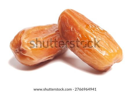 Dried dates fruit isolated on white