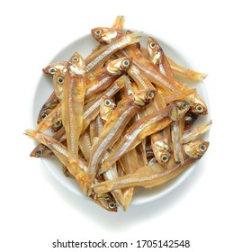 Dried Engraulidae Fish In Plate Isolated On White Background