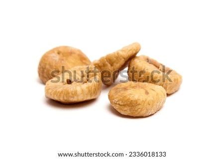 Dried figs isolated on white background. Group of sweet sundried fruits
