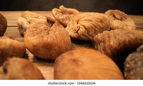 Dried figs on a wooden board - studio photography