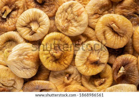 dried figs, top view. texture background for articles about healthy eating and proper lifestyle.