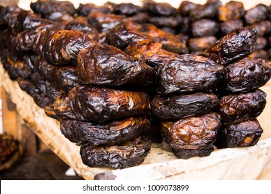 Dried fish rolled up ans stacked in Nigerian local market popular for soups and other dishes
