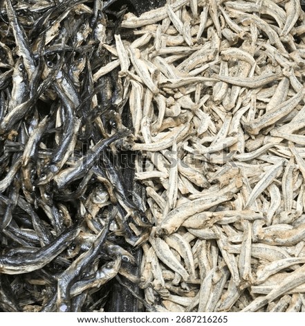 Dried fish, fish texture, delicious appetizer, beer appetizer, lots of fish, on store shelves, for sale, ready-made fish, smoked seafood, seafood, squid, dried seafood, for the table, appetizing appet