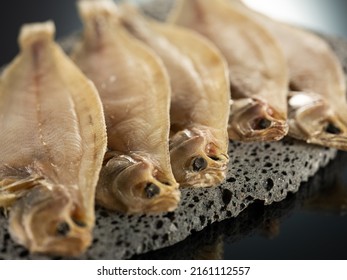 Dried Flounder On A Stone Plate	