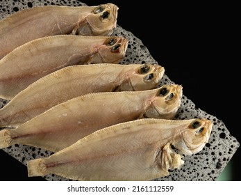 Dried Flounder On A Stone Plate	