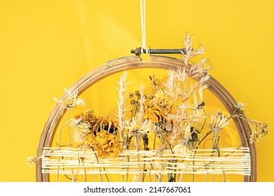 Dried Flower Decoration. DIY Floral Door Wreath From Yellow Dry Summer Flowers.