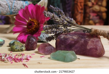 Dried Flowers And Crystal Stones On Meditation Altar Shallow DOF