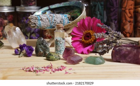 Dried Flowers And Crystal Stones On Meditation Altar Shallow DOF