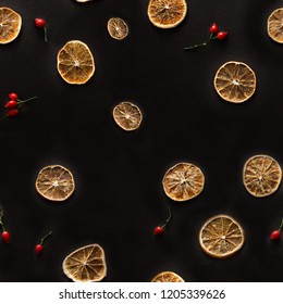 dried fragrant Christmas orange circles on white background with red hawthorn berries and green branches of a Christmas tree and juniper seamless pattern
 - Powered by Shutterstock