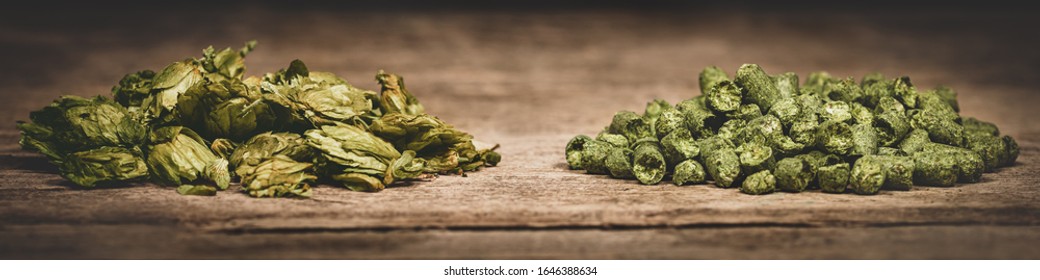 Dried Green Hop Pellets And Hop Cones On Wooden Ground, Ingredient For A Brewery Or Beer Plant, Panorama