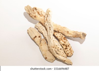 Dried Iris Pallida Rhizomes On A White Sheet