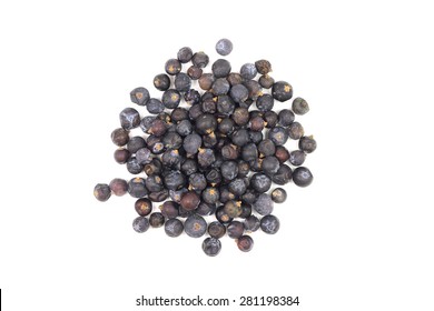 Dried juniper berries are black on a white background