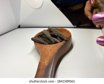 Dried Kapok Buds Or Marathi Moggu (Indian Spice) On A White Background