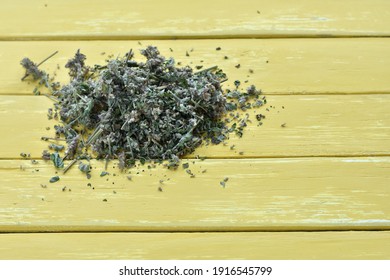 Dried Lemon Balm On A Yellow Vintage Table, Copy Space