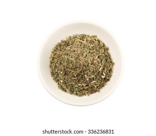 Dried Lemon Balm In White Bowl Over White Background