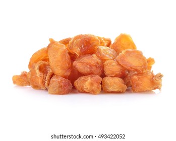 Dried longan fruit on white background.