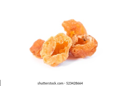 Dried longan isolated on a white background. Shallow depth of field