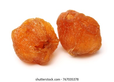 Dried longan whole meat on white background.