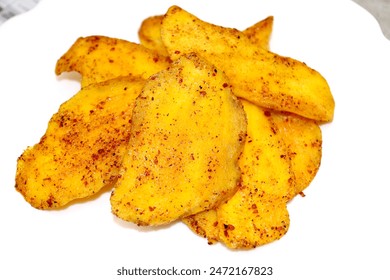 Dried mango, mixed with chili and salt, Mix salt, pepper,  Thailand - Powered by Shutterstock