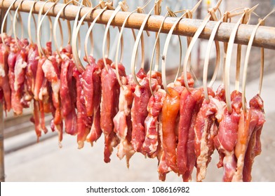 Dried Meat On The Wooden Row