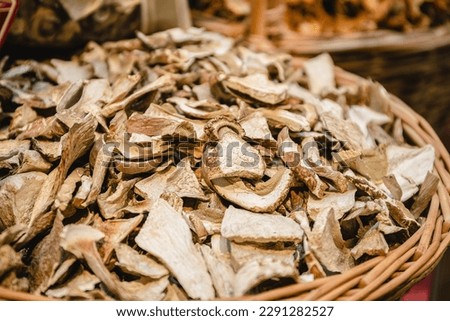 Dried mushroom slices, dried porcini mushrooms on sale in the store, dried mushrooms on the market, high protein product, dehydrated mushrooms, vegetarian or vegan food.