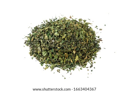 dried nettle herb or in latin Utricae folium heap of isolated on white background. medicinal healing herbs. herbal medicine. alternative medicine