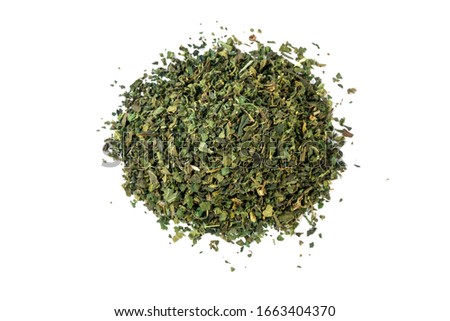 dried nettle herb or in latin Utricae folium heap of isolated on white background. medicinal healing herbs. herbal medicine. alternative medicine