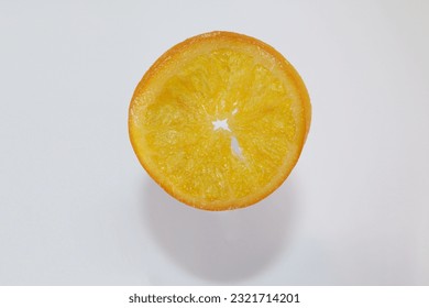 
Dried orange, sliced ​​1 piece, white background