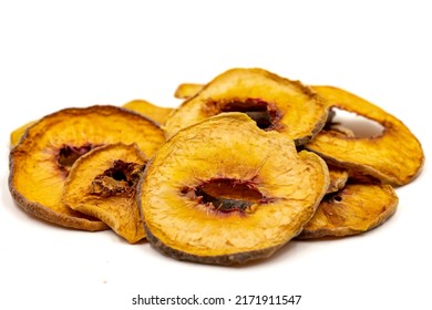 Dried Peach Slices. Sliced Dry Peach Isolated On White Background. Sun-dried Fruit. Close Up