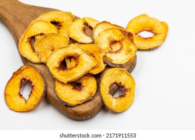 Dried Peach Slices. Sliced Dry Peach Isolated On White Background. Sun-dried Fruit. Close Up