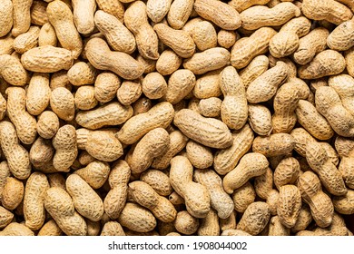 Dried peanuts. Tasty groundnuts. Texture. Top view.