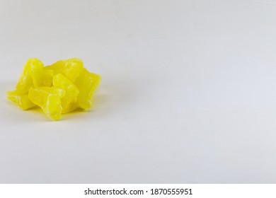 Dried Pineapple Chunks On Isolated On A White Background With Copy Space
