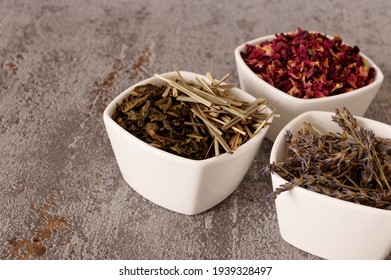 Dried Plants Parts In Bowls. Lavender, Lemongrass, Green Tea And Rose Petals. Self Made Potpourri.