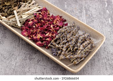 Dried Plants Parts On A Plate. Lavender, Lemongrass, Green Tea And Rose Petals. Self Made Potpourri.