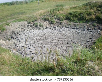 Dried Ponds And Mud During The Long Summer Dry Season In The Open Area Of ??the Meadow