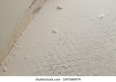 Dried Putty In The Form Of Powder On The Floor