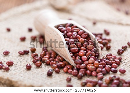 Dried red beans on dark rustic wooden background Stock foto © 