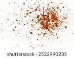 Dried red chili powder flew around. Splash of red chili powder on white background