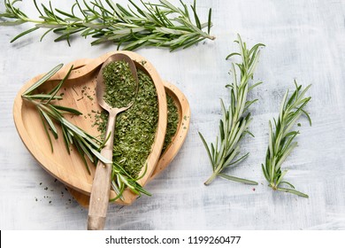 Dried rosemary with fresh rosemary twigs. Top view