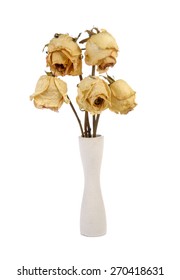 Dried roses in vase on white background