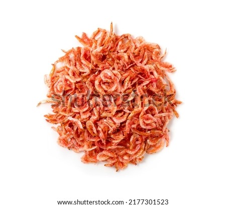 Dried sakura shrimps placed on a white background. Image of Japanese food. View from above.