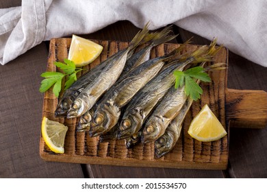 Dried Sardine On Wooden Boar