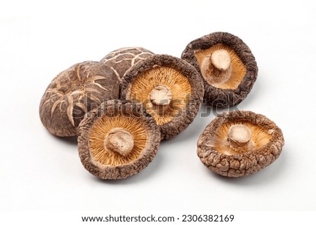 dried shiitake mushrooms isolated on white background.