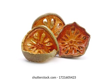 Dried Sliced Bael Fruit Isolated On White Background. Bael Fruit Has Anti-inflammatory Property, Helps To Heal Digestive Disorders, Used As A Remedy For Asthma, And Common Cold. Herbal Tea Ingredients