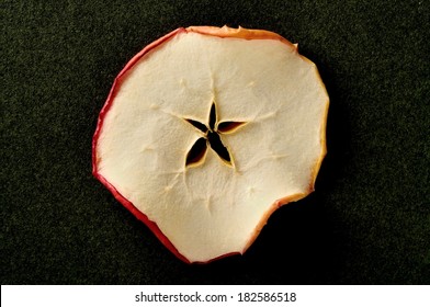 Dried Slices Of Red Apple Peel, Core Star On Black Background