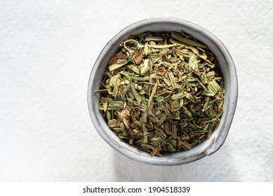 Dried Tarragon Herb In A Bowl